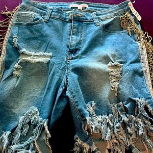 Distressed Jean shorts with sparkly fringes